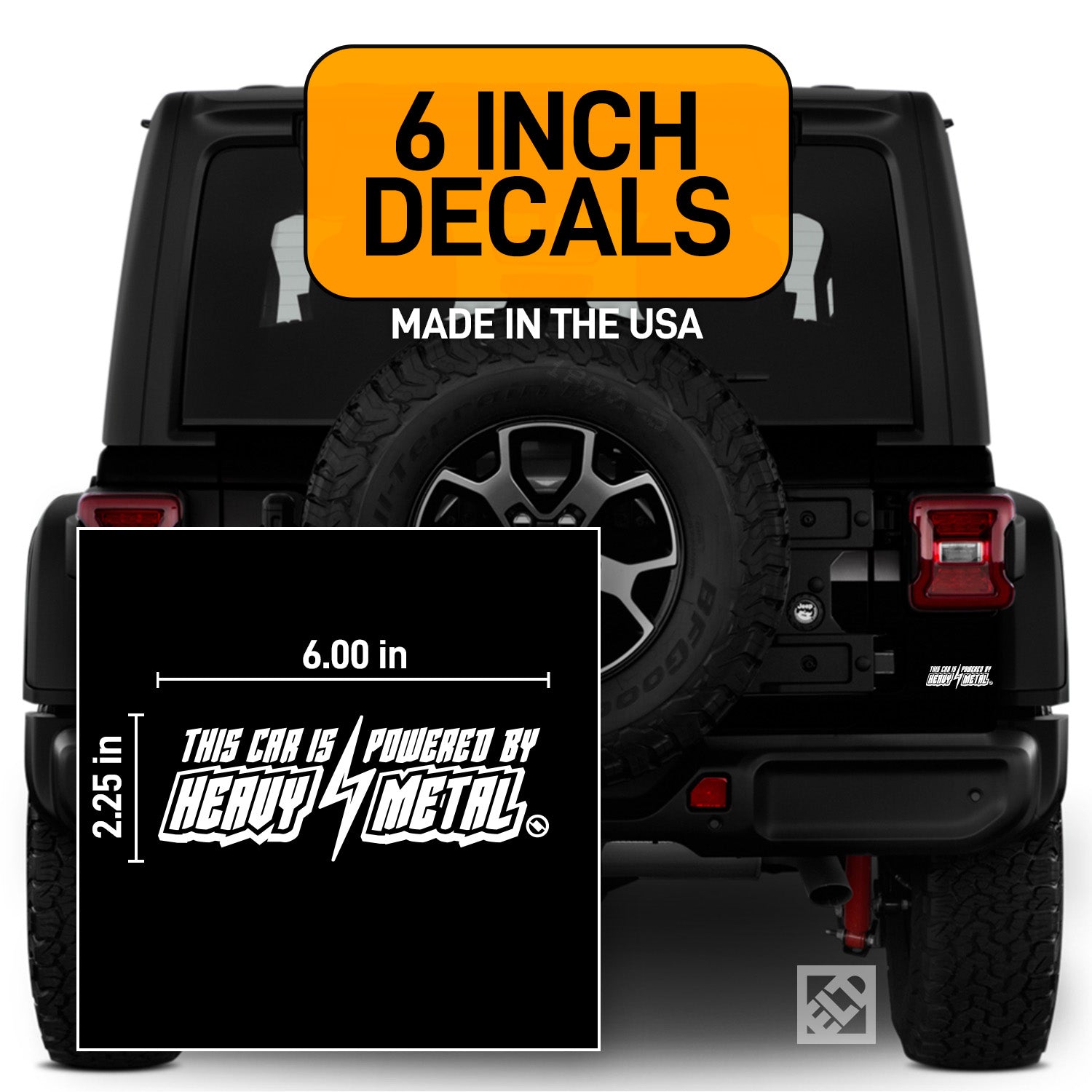 White 6 inch "This Car is Powered by Heavy Metal" vinyl decal on a black Jeep.