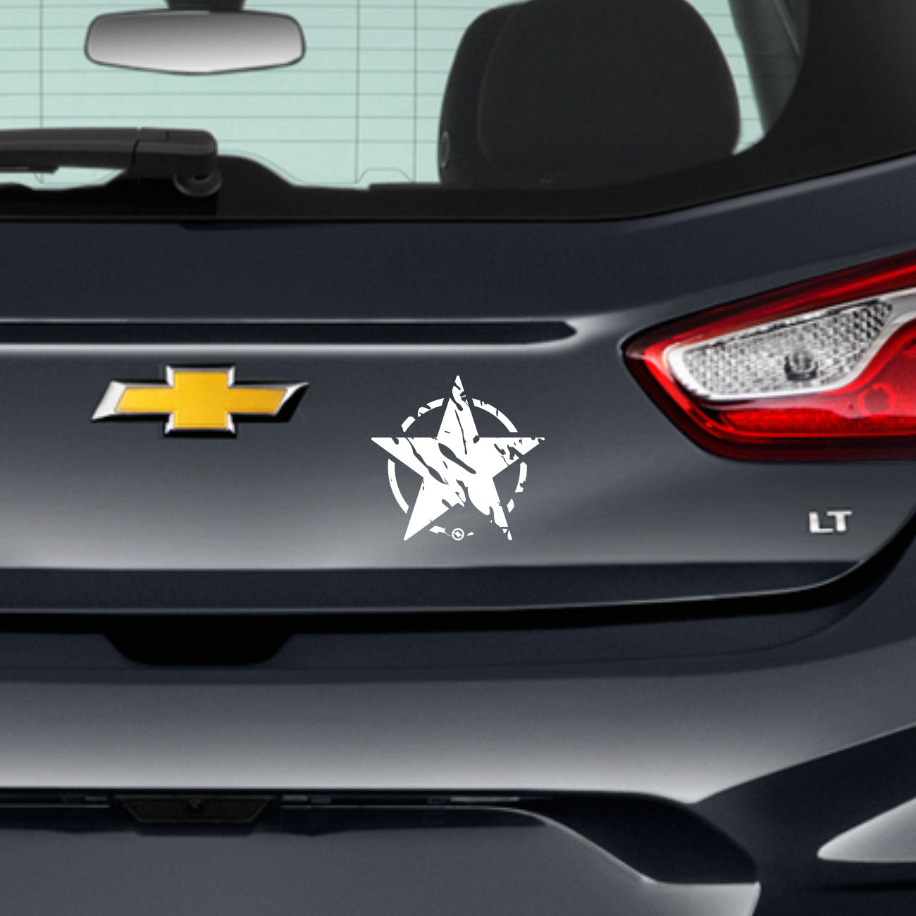 Close up of white Distressed Star design decal on rear of car